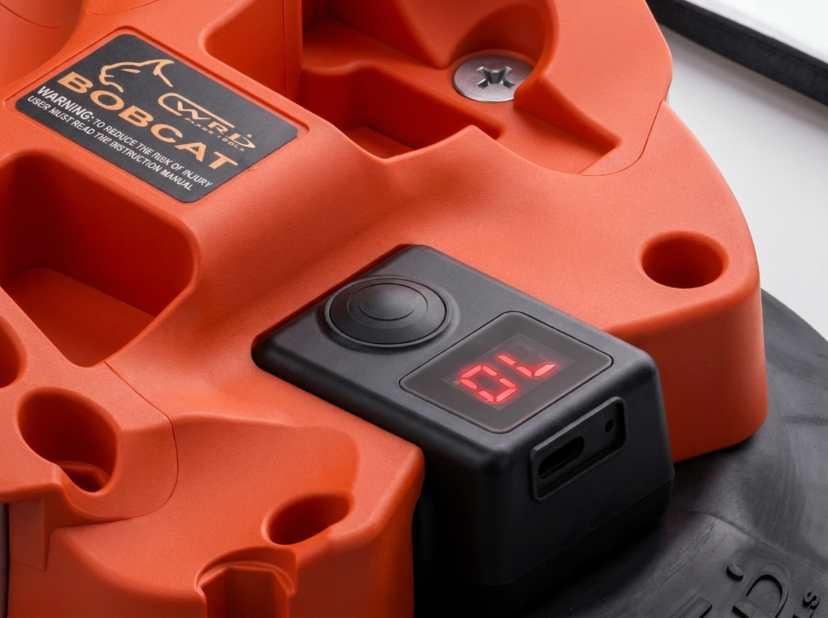 Product illustration showing the Bobcat vacuum pump, button and digital display close up