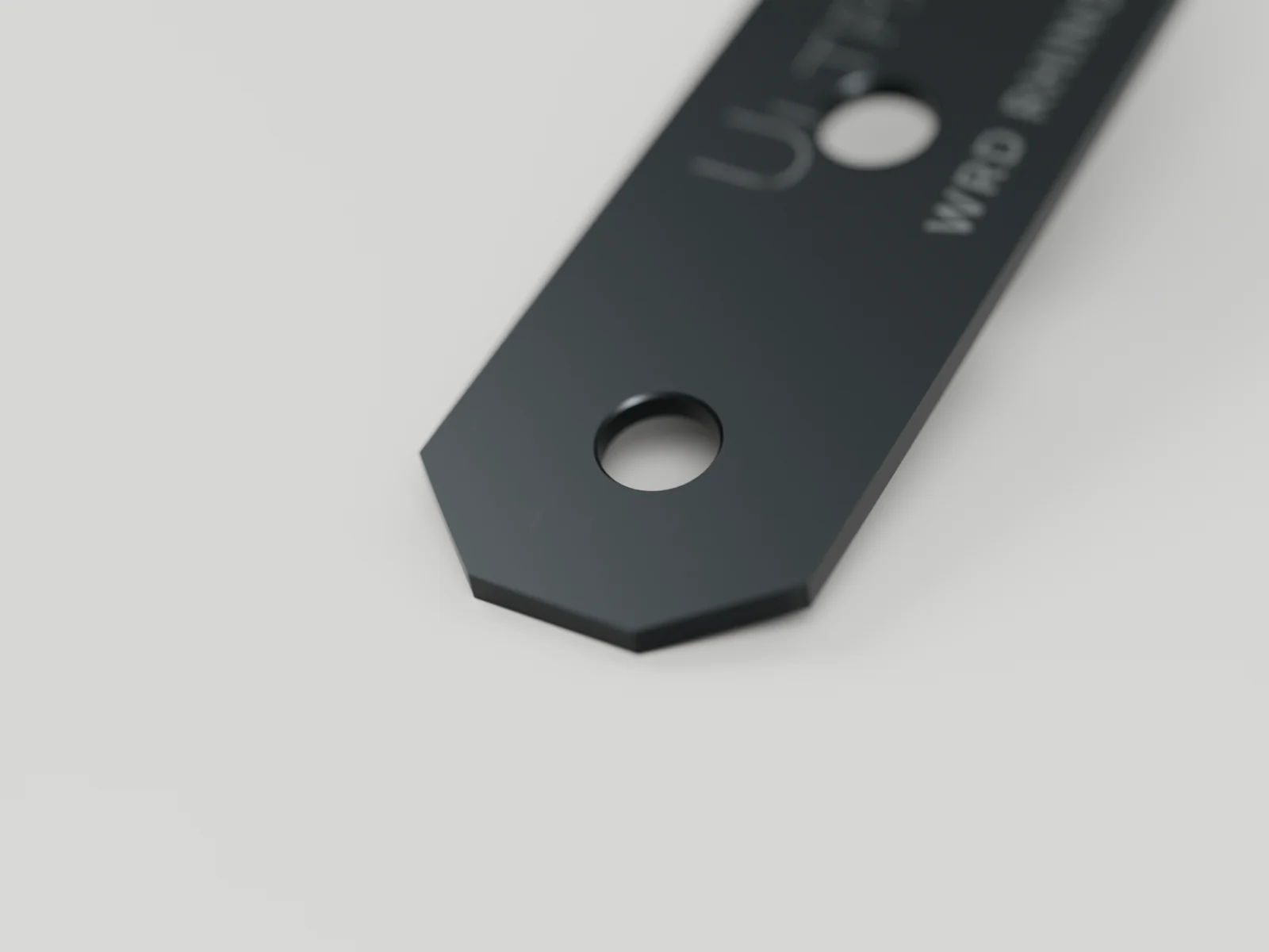 Chamfered end and mounting holes of a Rhino blade shank